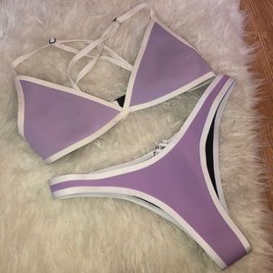 Purple hoaka swimsuit with white piping!